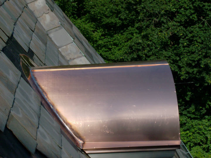 Copper barrel dormer flat seam roof - side view.
